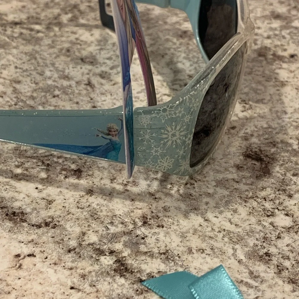 Disney frozen sunglasses, necklace, and stuffed animal lot